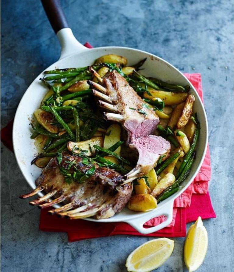Lamb rack roasted in the pan with baby potatoes, beans and mint
