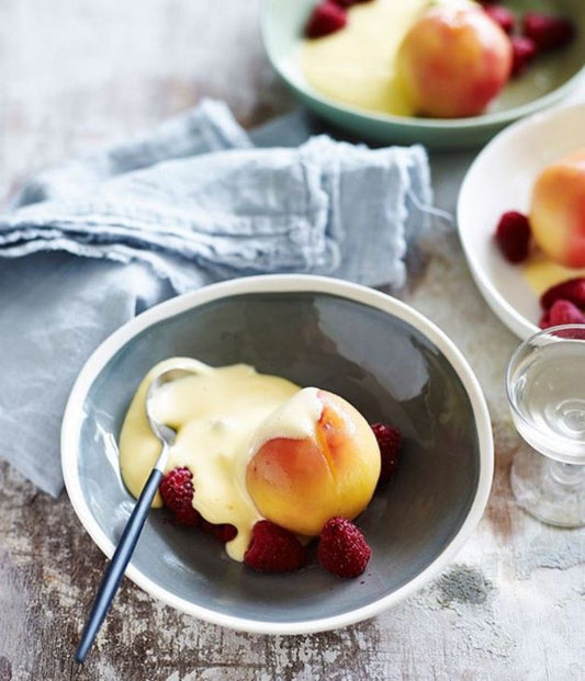 Peaches and raspberries with prosecco zabaglione